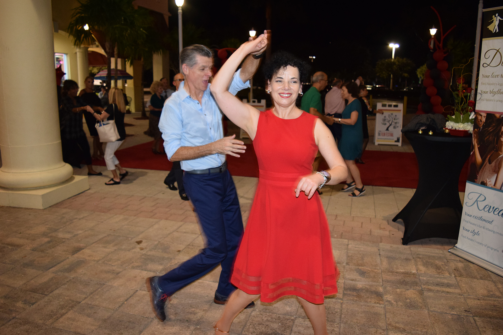 Photo of two people dancing at the Bonita Springs Short Film Festival red carpet area